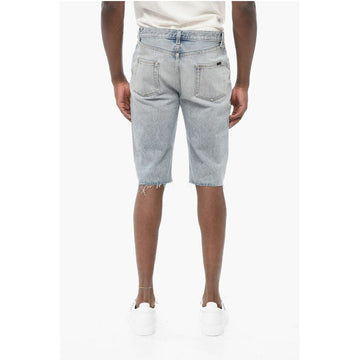 Saint Laurent Light Wash Denim Shorts with Fringed Bottom
